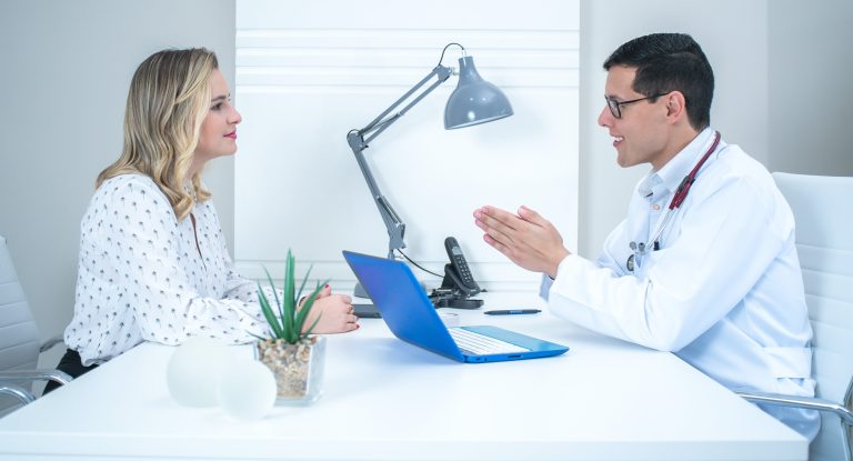 A woman asking a doctor about things needed before abortion.