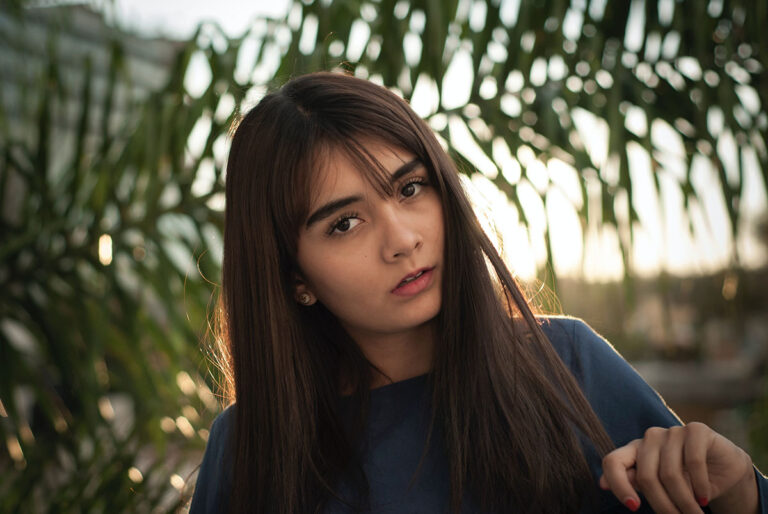 Young woman thinking about her pregnancy